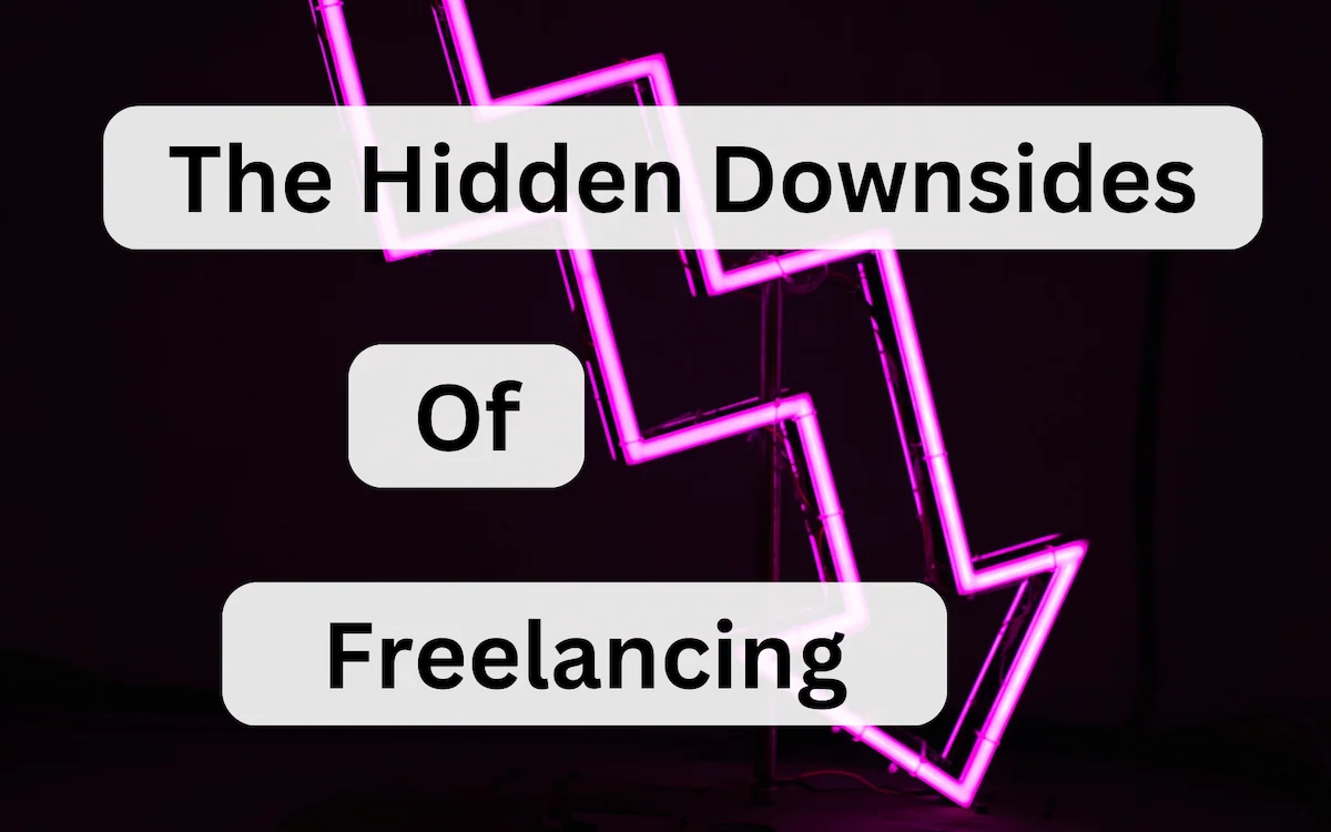 A pink neon sign of a downward pointing arrow with text saying The Hidden Downsides Of Freelancing.